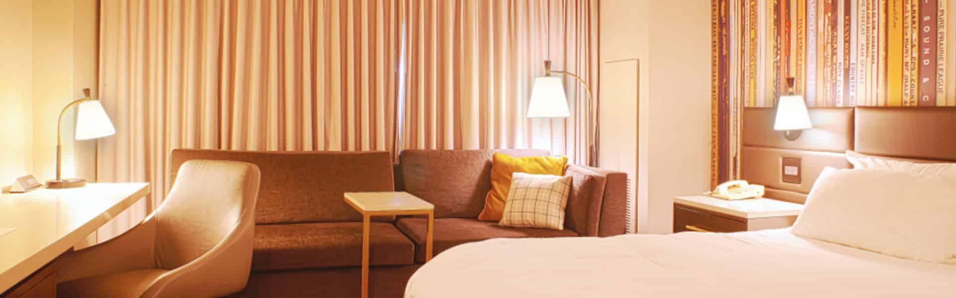Commercial floor lamps engineered for hospitality guest rooms